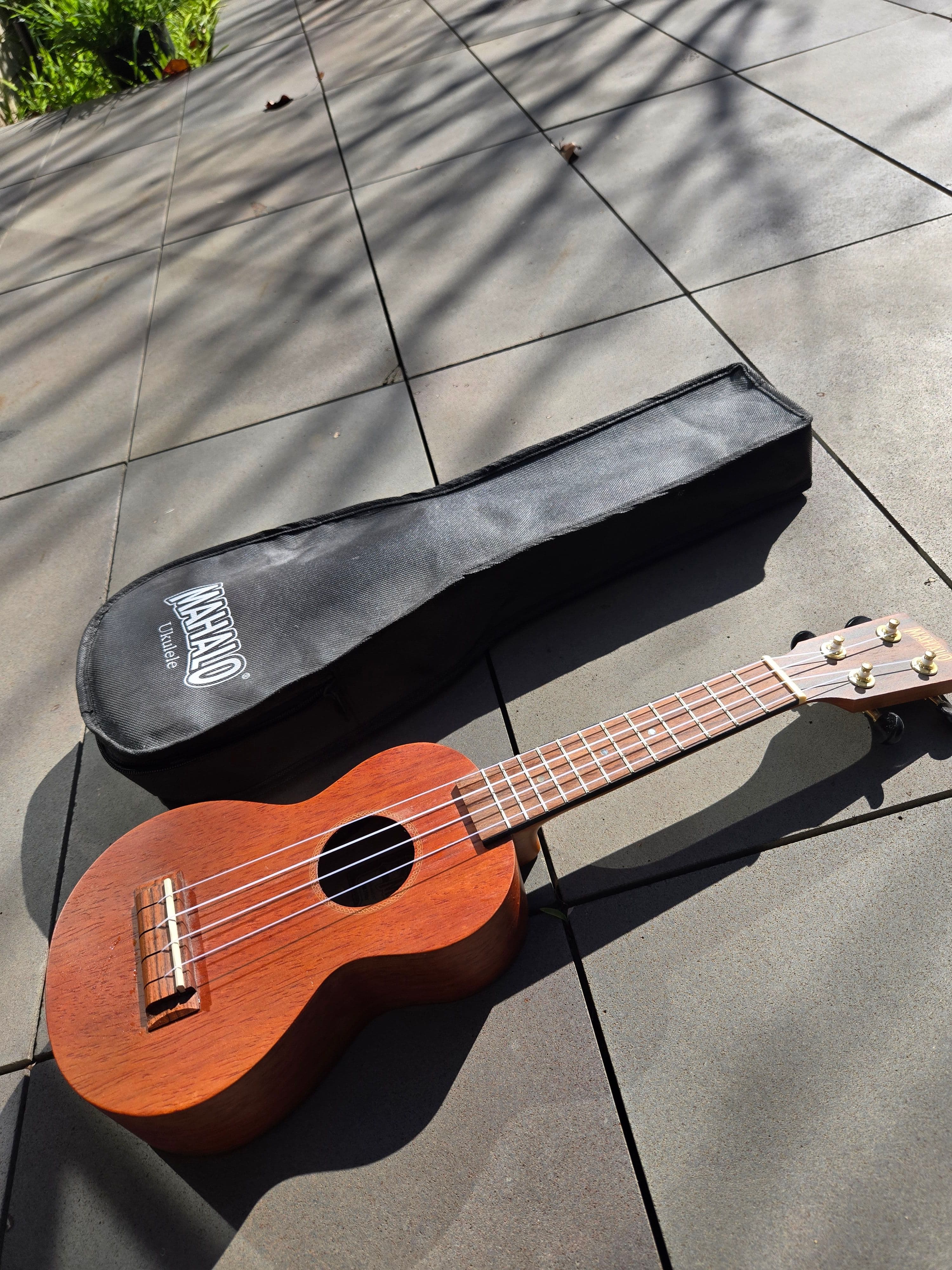 Brown Wooden Ukulele, photo 2 of 3